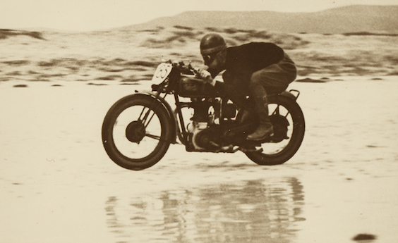 Levis Motorcycle Club member Reg Ellard races along Sellicks Beach in 1936.