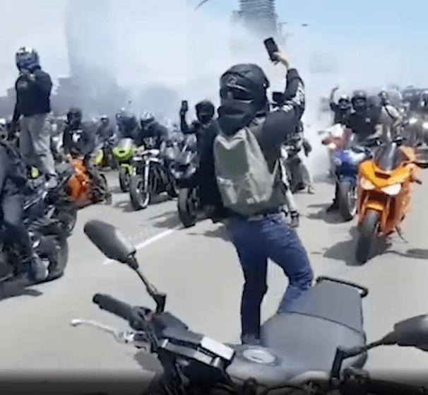 Police seek riders in stunt groups peer