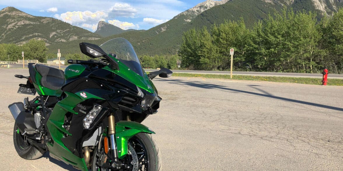 2018 Kawasaki Ninja H2SXSE with mountains in the background.