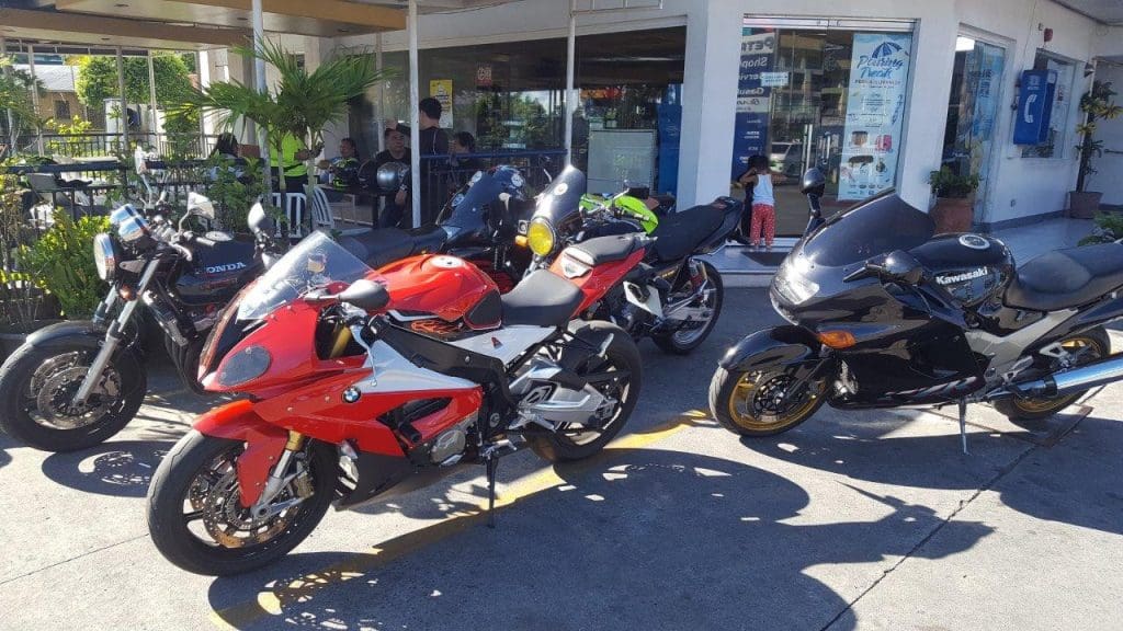 Various bikes parked outside shop