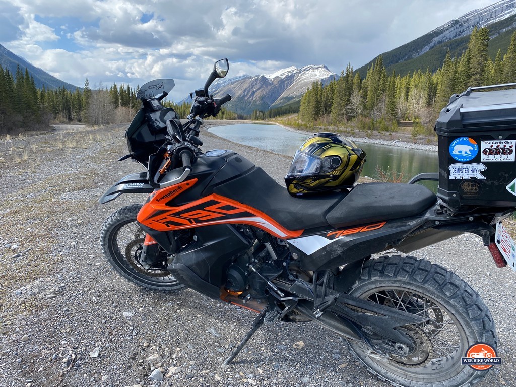 The Shark Spartan GT helmet sitting on the seat of a KTM 790 Adventure in the Canadian Rockies near Canmore, Alberta.
