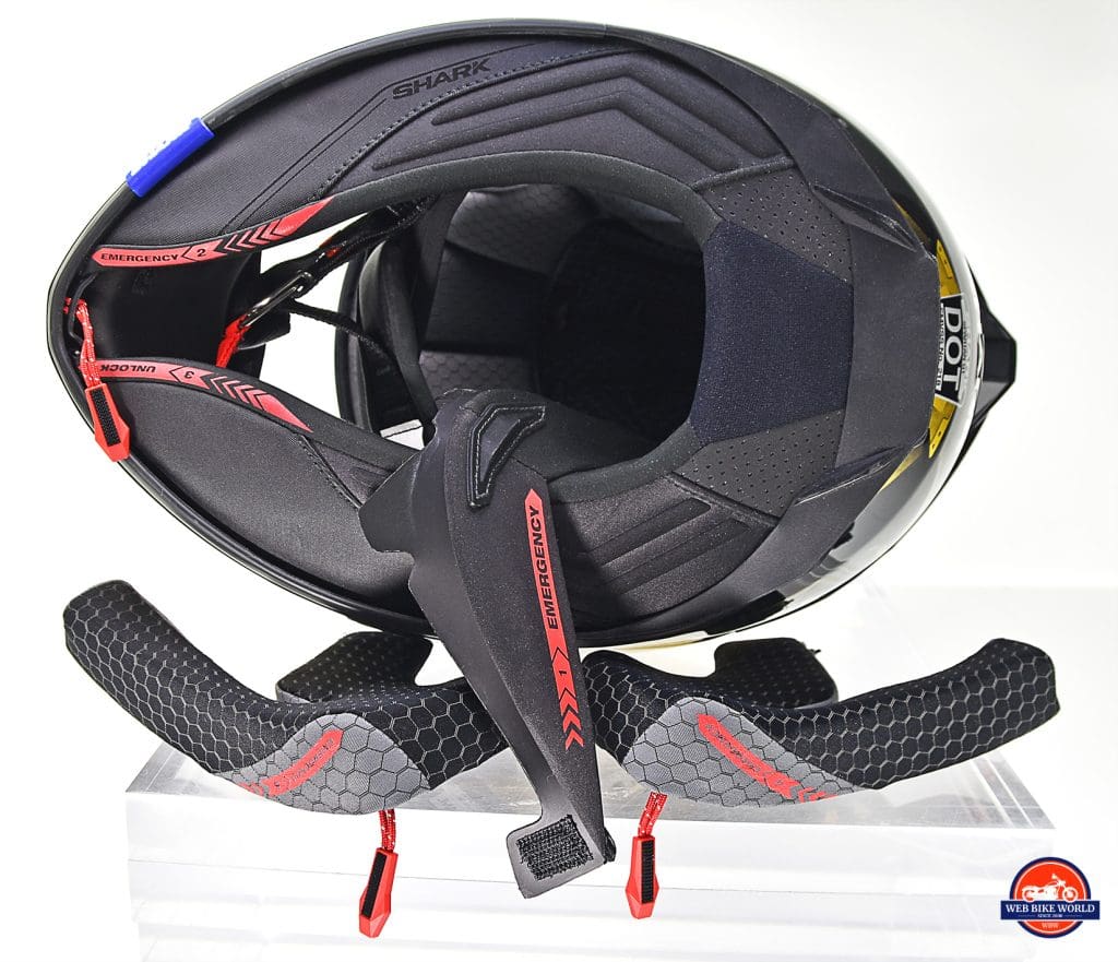 The Shark Spartan GT Replikan interior padding has an emergency removal system on it.