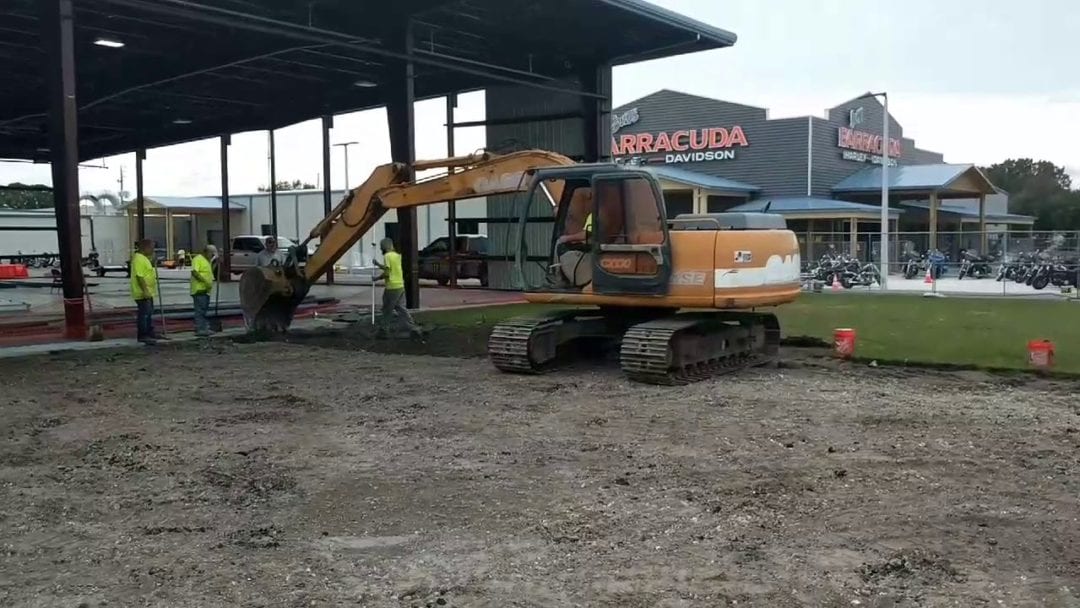 workers break ground on the build that will eventually become the OCC roadhouse and Museum