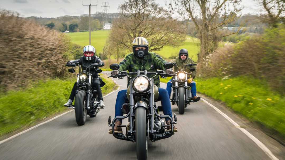 a trifecta of motorcycle riders enjoying their respective bikes