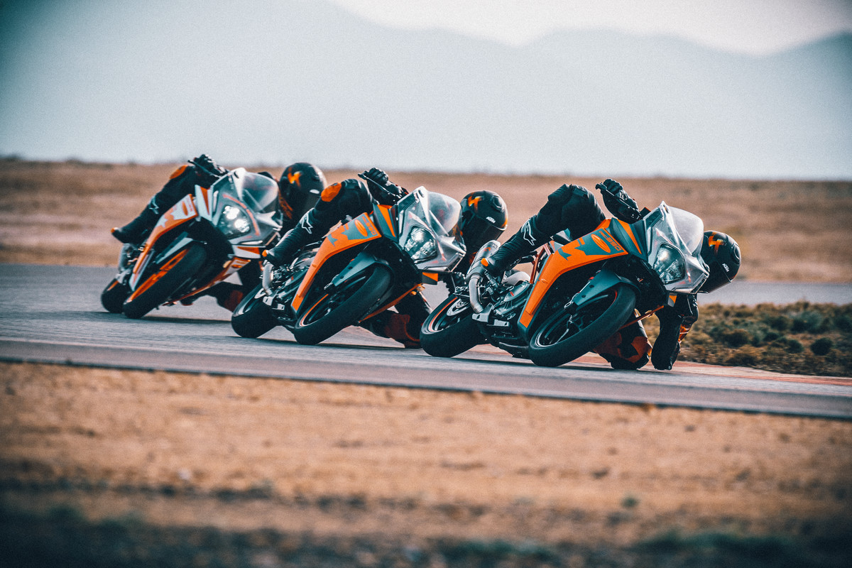 A view of racers trying out the all-new 2022 KTM RC390 on the track