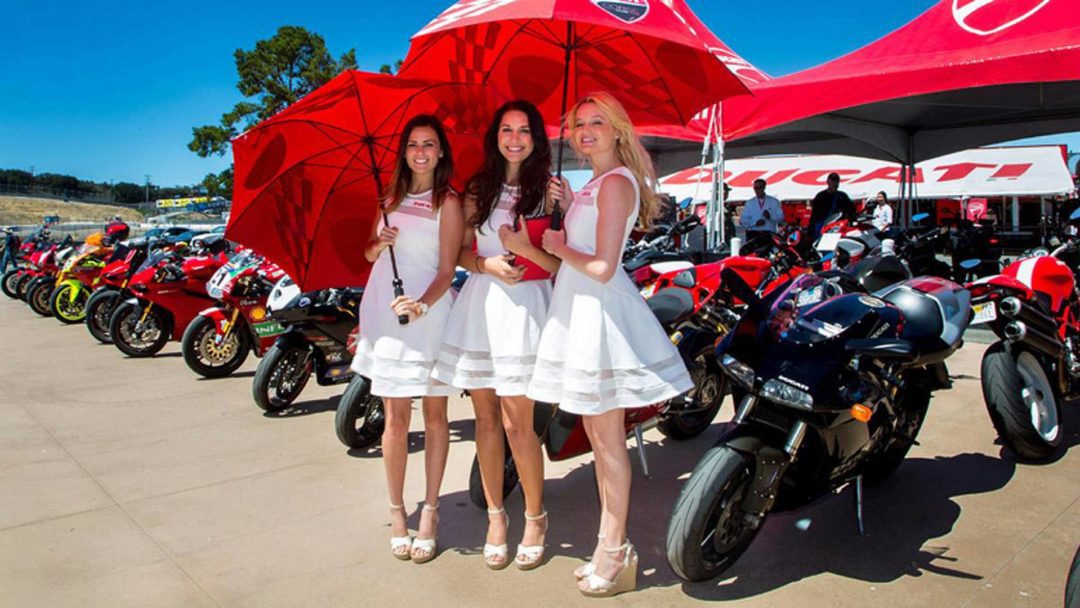 A view of three girls connected with riders attending the 2019 Ducati Island Experience
