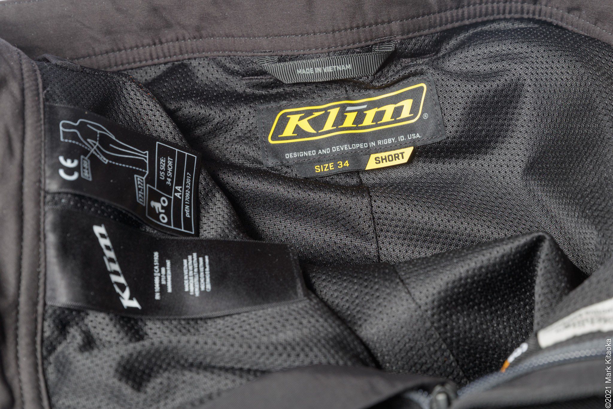Interior tag of the Klim pants showing size and cut