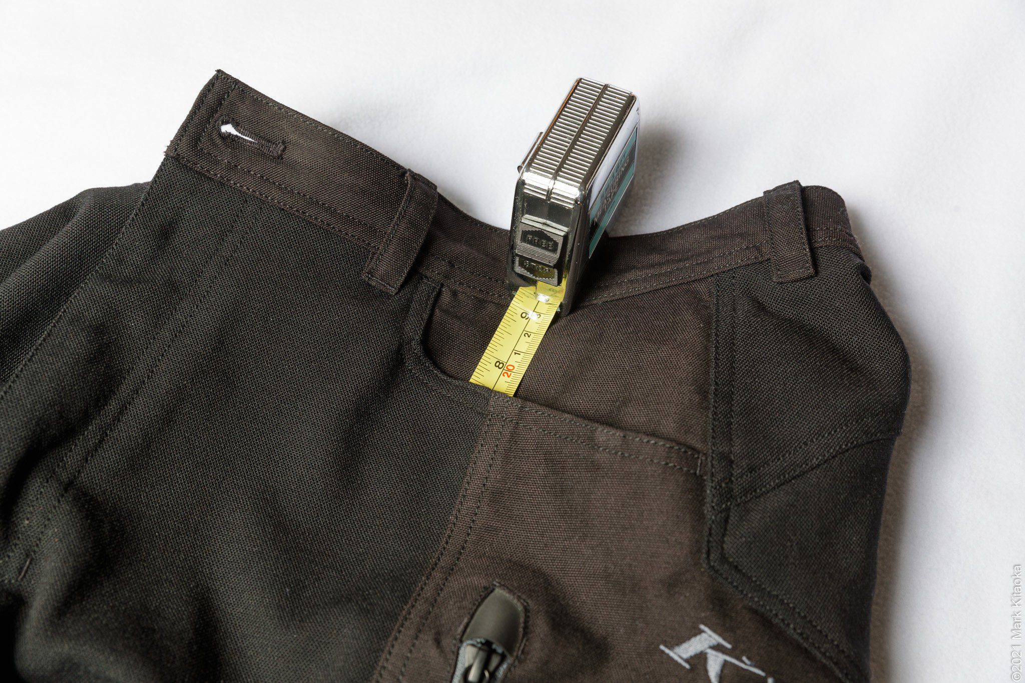 Closeup showing 7.5" depth for front left pocket