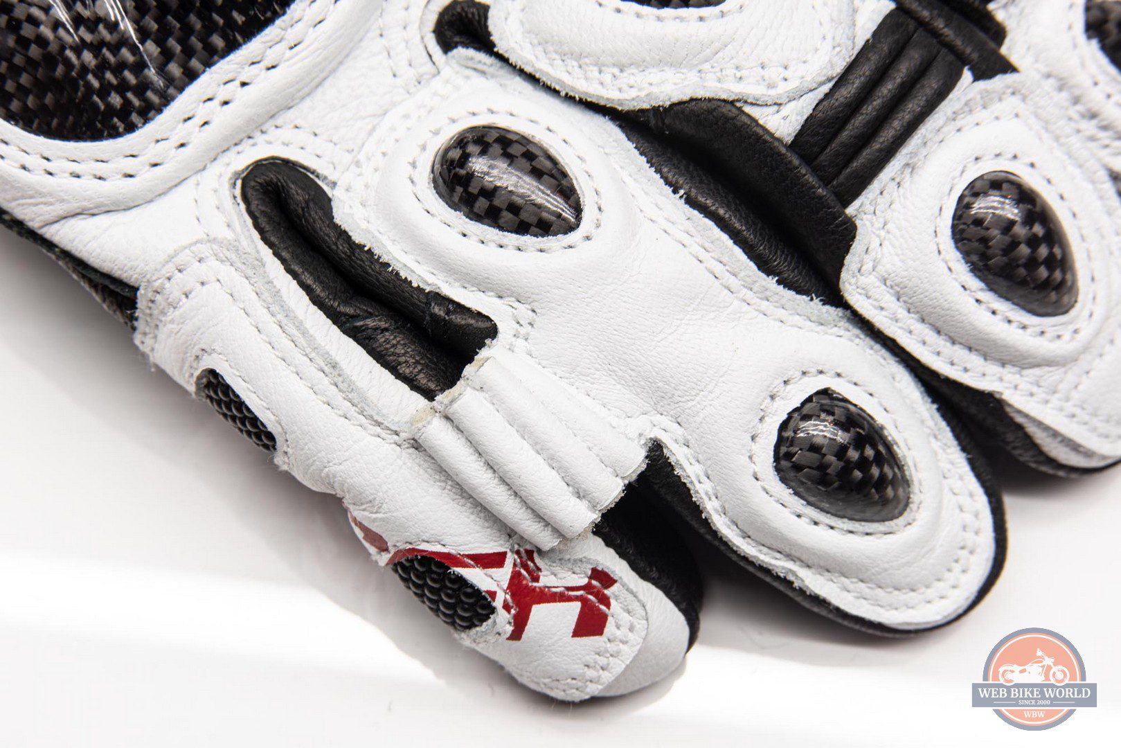 Closeup of ring and little finger bridge on Hi Per gloves