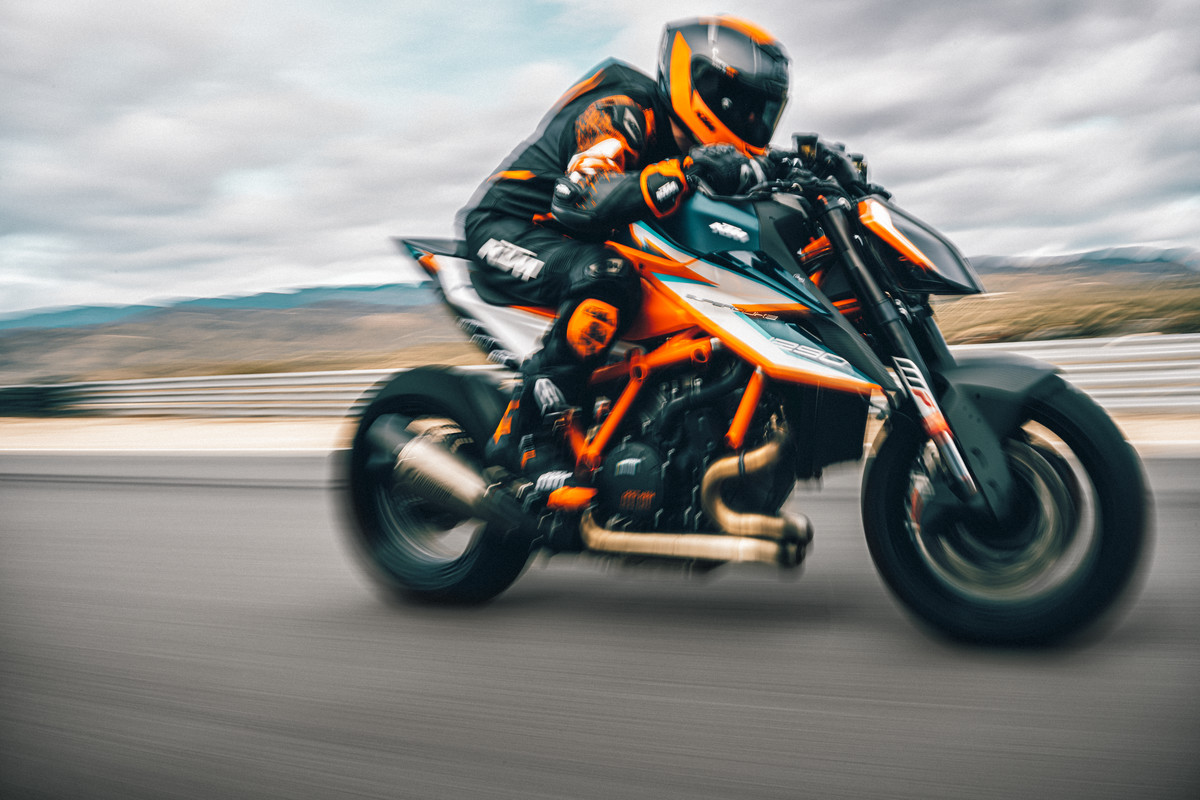 A side view of a rider on the KTM 1290 Super Duke RR