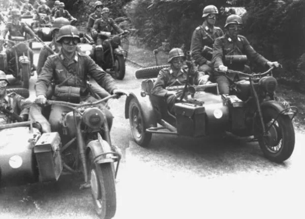 A view of the military troops that used the Harley-Davidson motorcycles - specifically, the WLA 'Liberators'