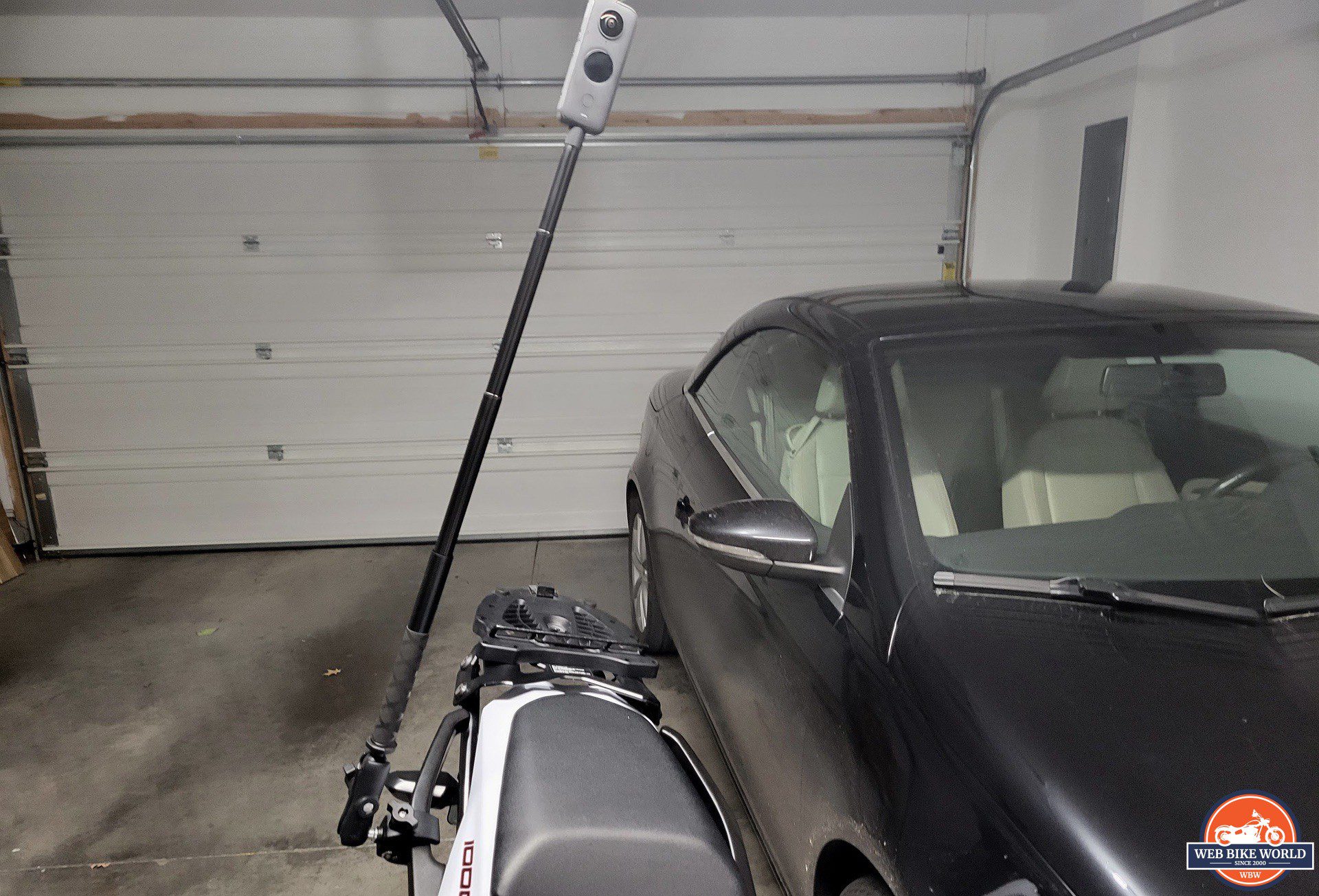 Insta360 One X2 Camera on selfie stick mounted on motorcycle