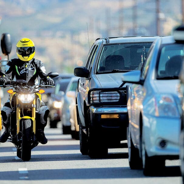A motorcyclist lane filtering. Media sourced from Rider Magazine.