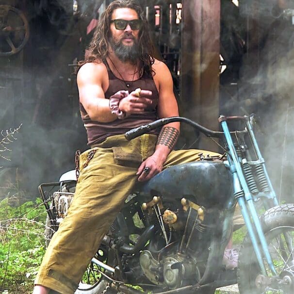 Jason Momoa on one of his motorcycles. Media sourced from Man's Journal.