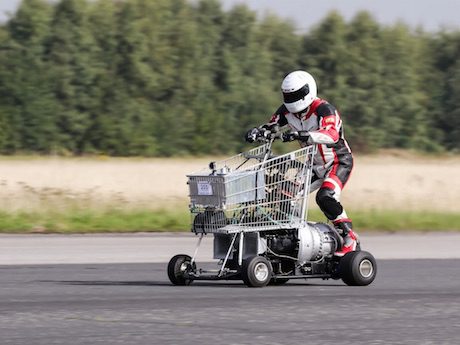 Matt McKeown (Plymouth) on his jet powered shopping trolley set an unofficial world record of 61.18mph (photo Steve McDonald) wheelie