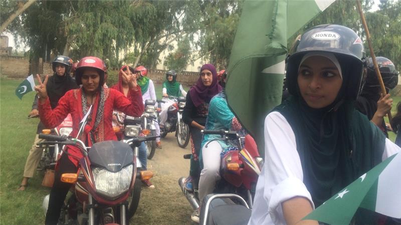 Women riders in Pakistan (photo Maryiam Pervaizal, Al Jazeera) barriers