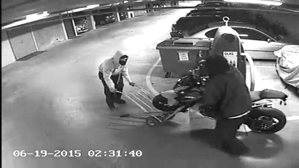security footage of a motorcycle being stolen