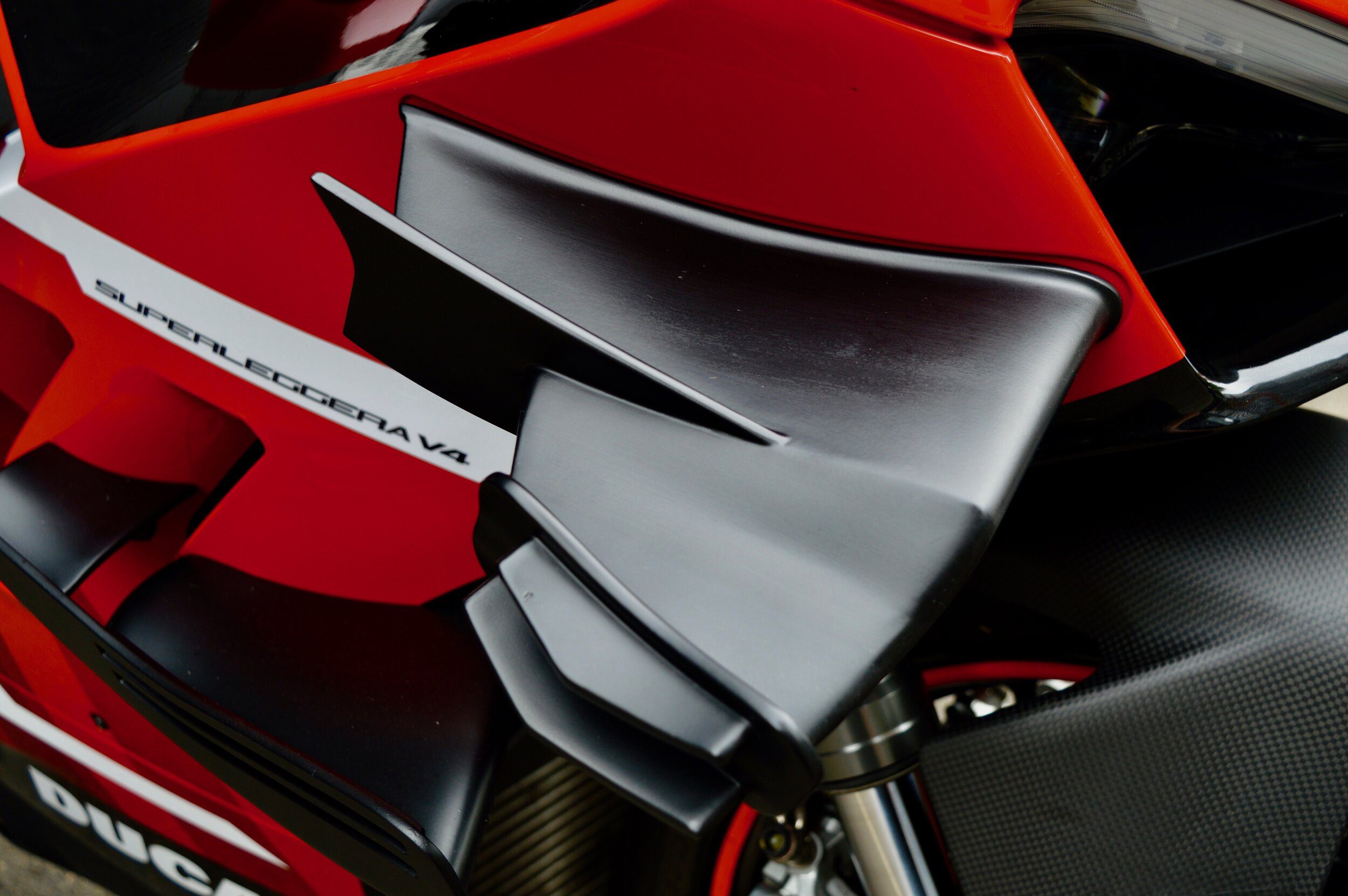 a detail shot of winglets on a Ducati Panigale Motorcycle