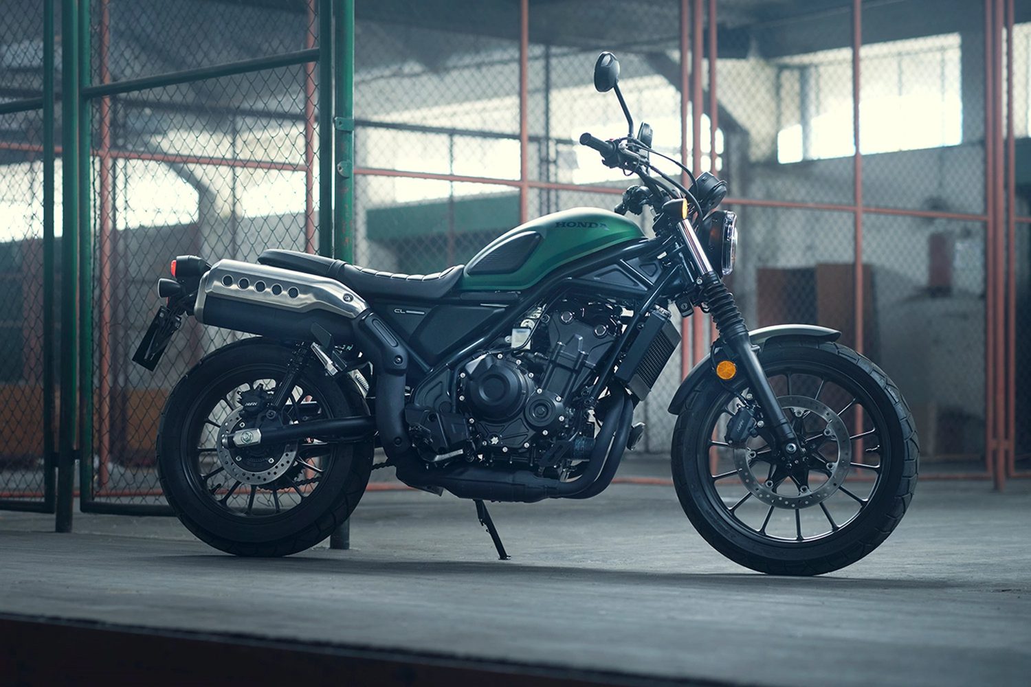 Honda's 2023 CL500 Street Scrambler motorcycle parked in a factory setting