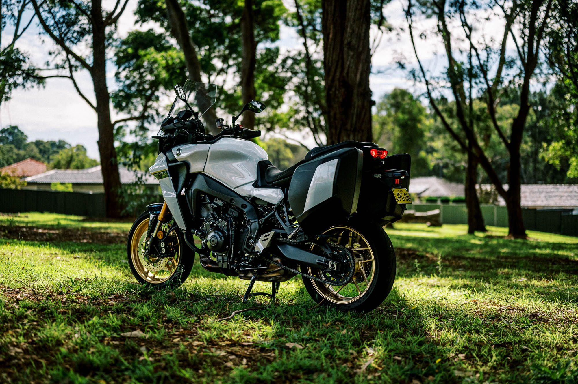 A 2023 Yamaha Tracer 9 GT Motorcycle in a Sydney Park