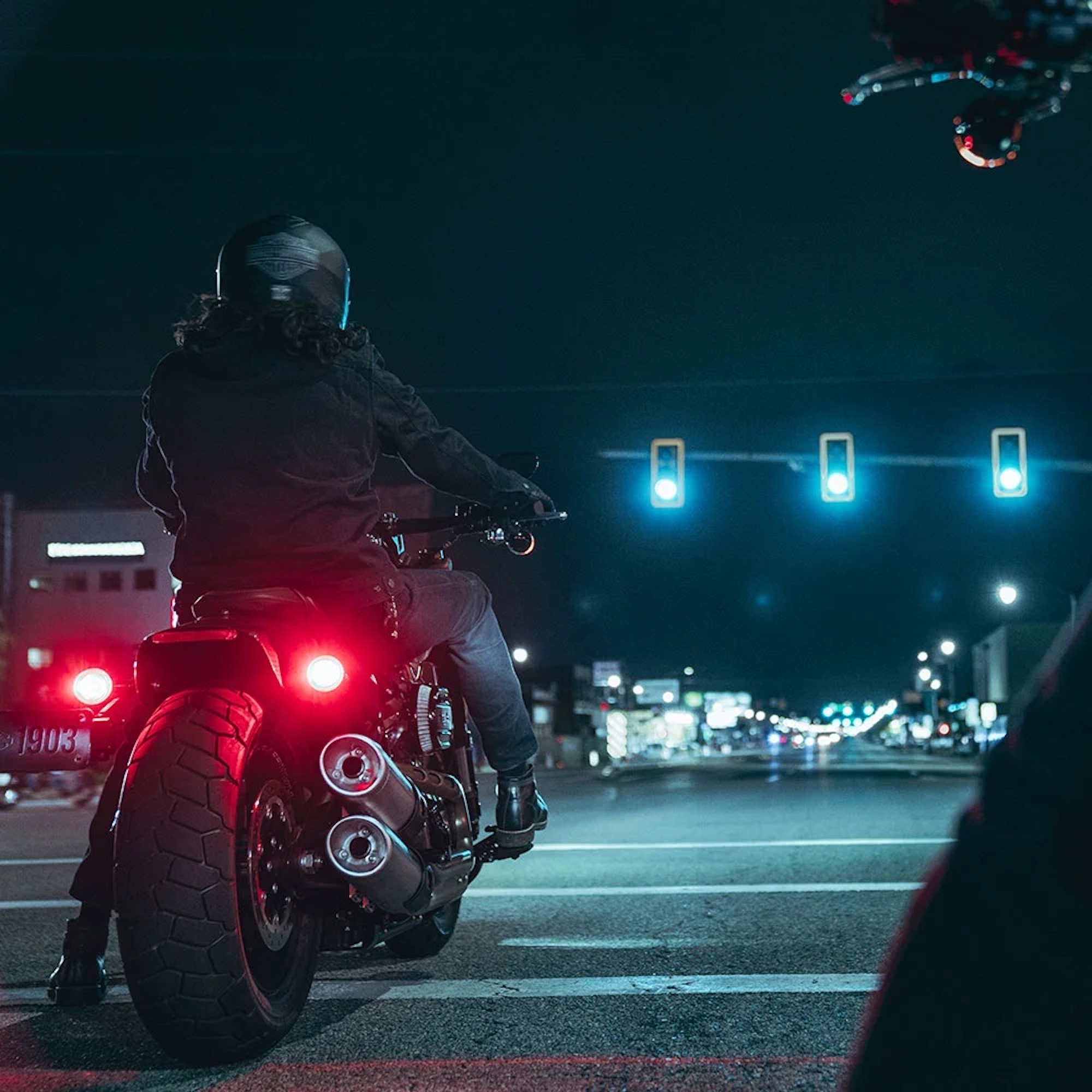 A pair of Harley-Davidson motorcyclists at night. Media sourced from Harley-Davidson.