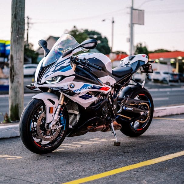 A 2023 BMW S 1000 RR motorcycle parked outside at dusk in Sydney