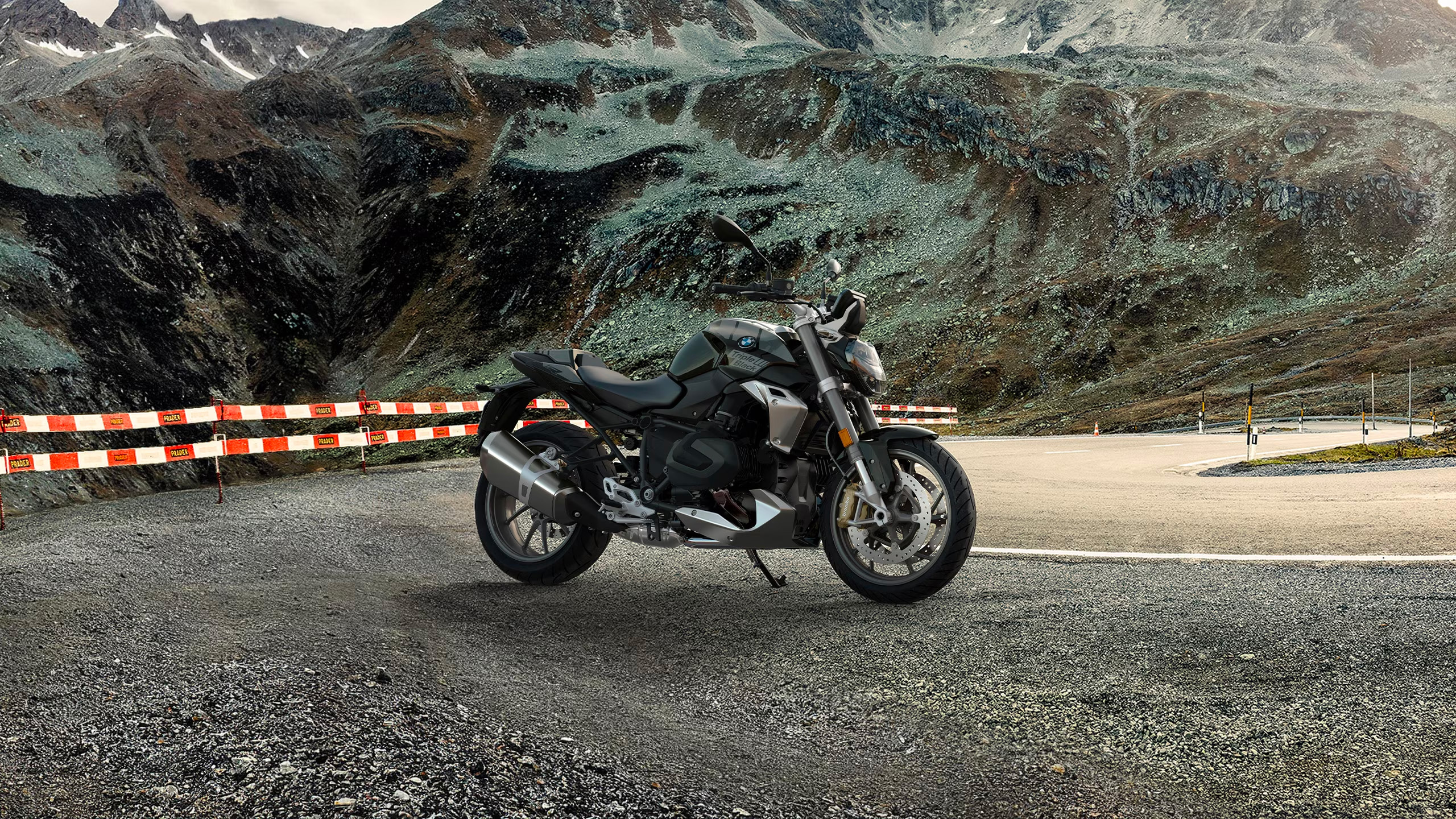 photo of a 2023 BMW R 1250 R motorcycle in the European mountains