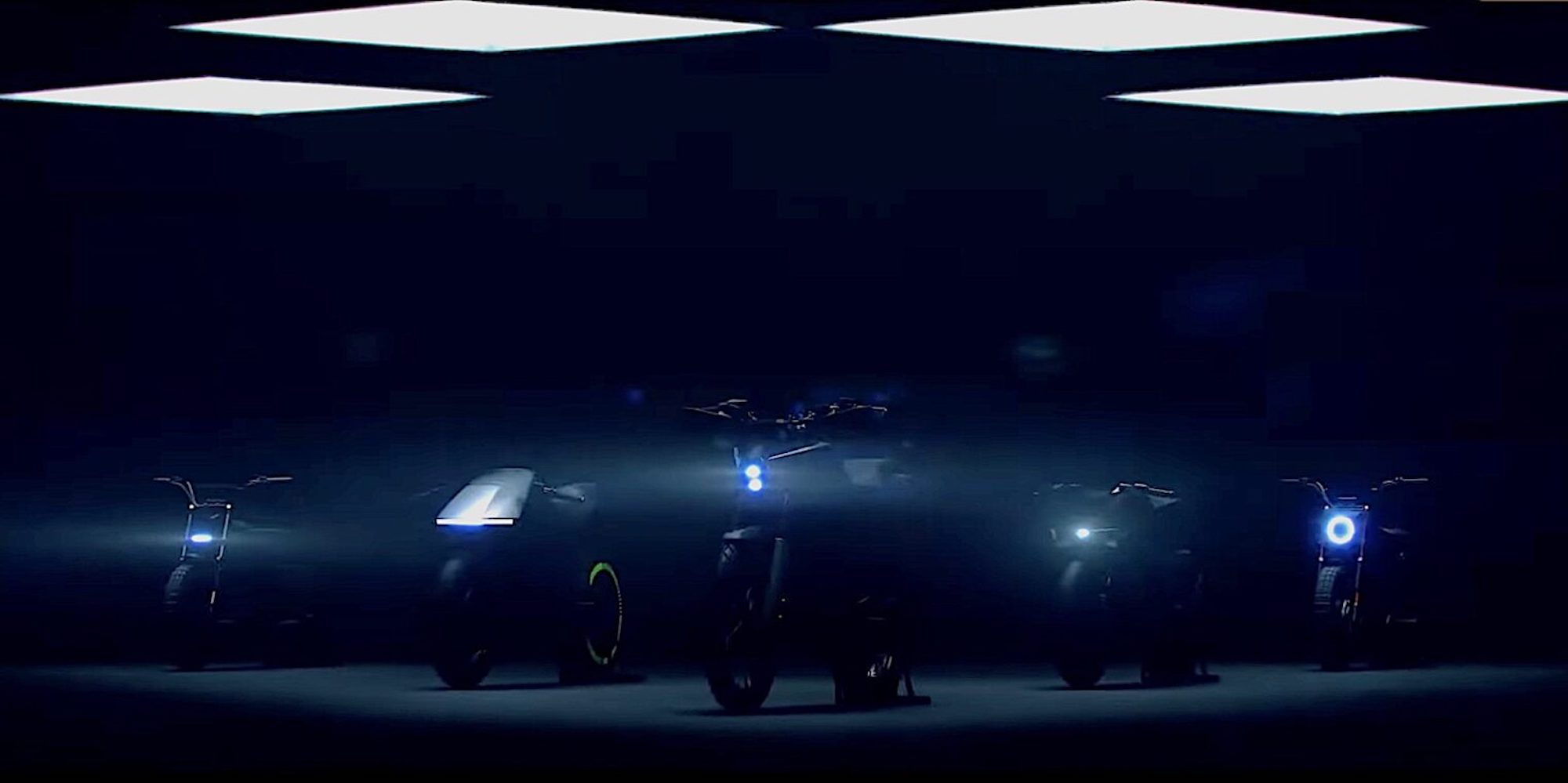 A view of Ola's teaser trailer showing a series of bikes waiting for their debut. Media sourced from Youtube.