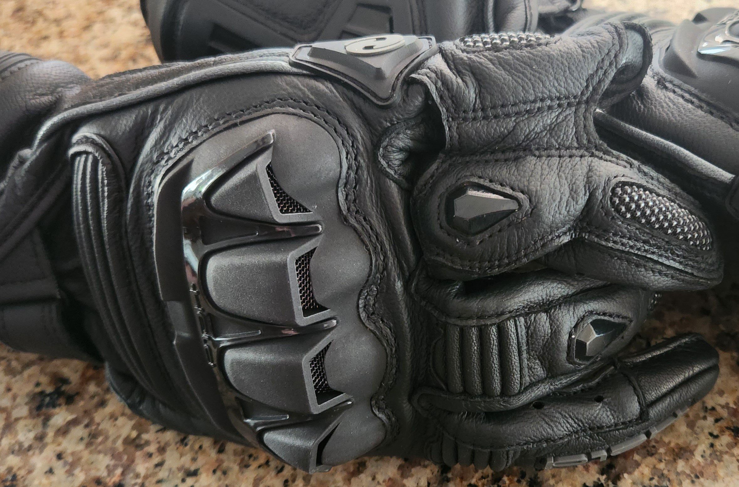 Closeup of the knuckle protectors on the gloves