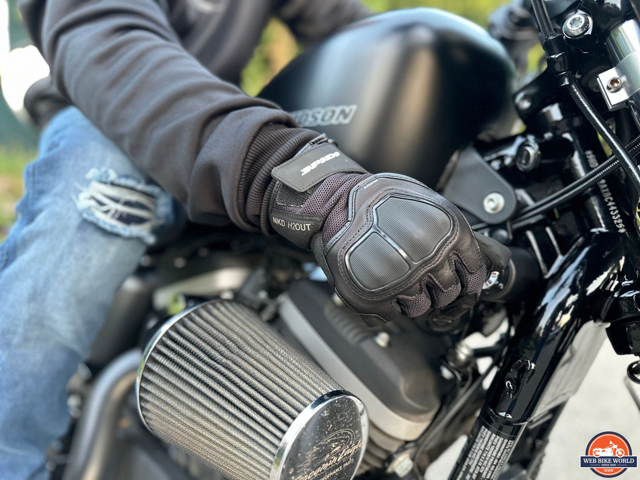 Hand turning the key of a Harley Davidson Iron 883