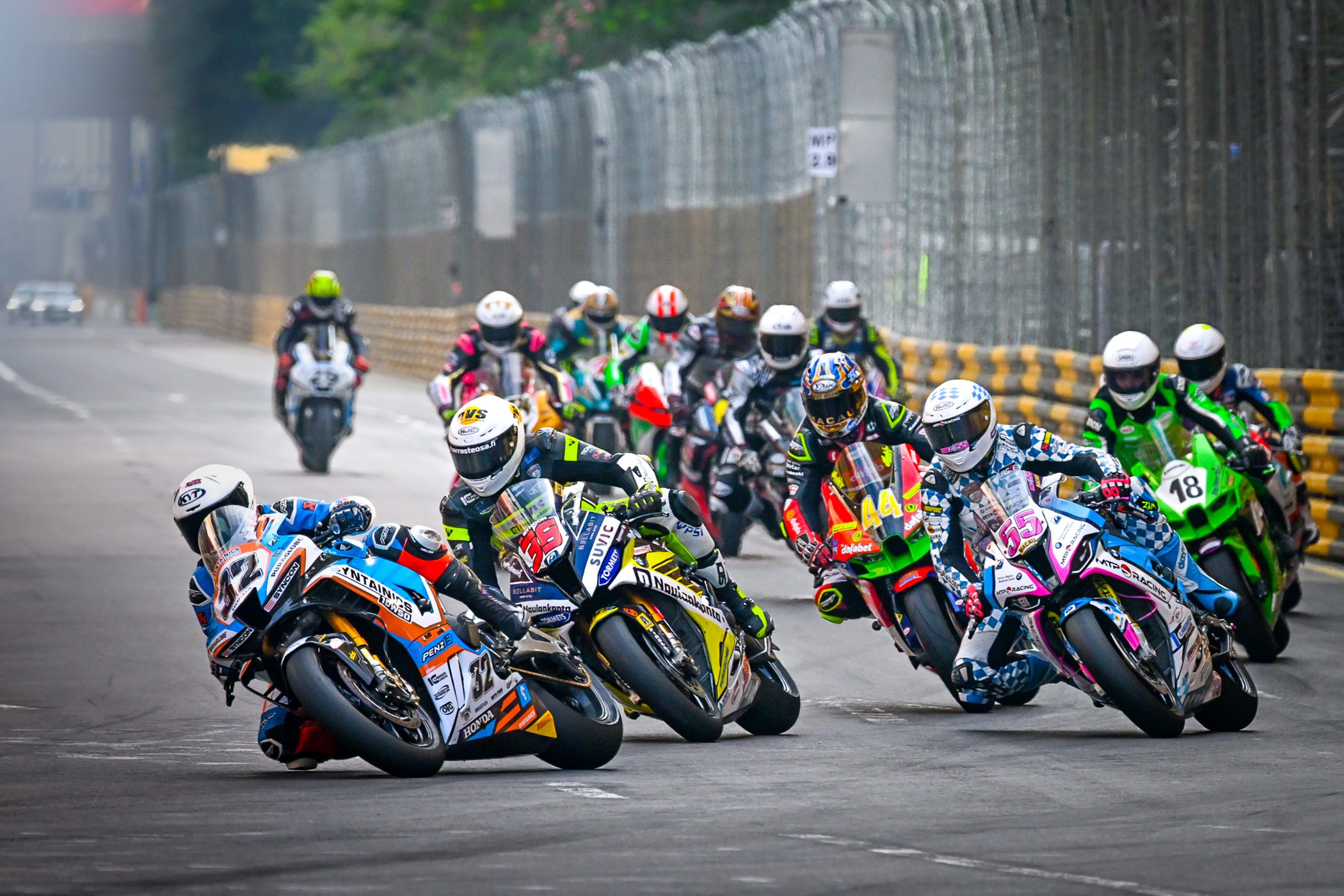 motorcycles racing at the guia circuit